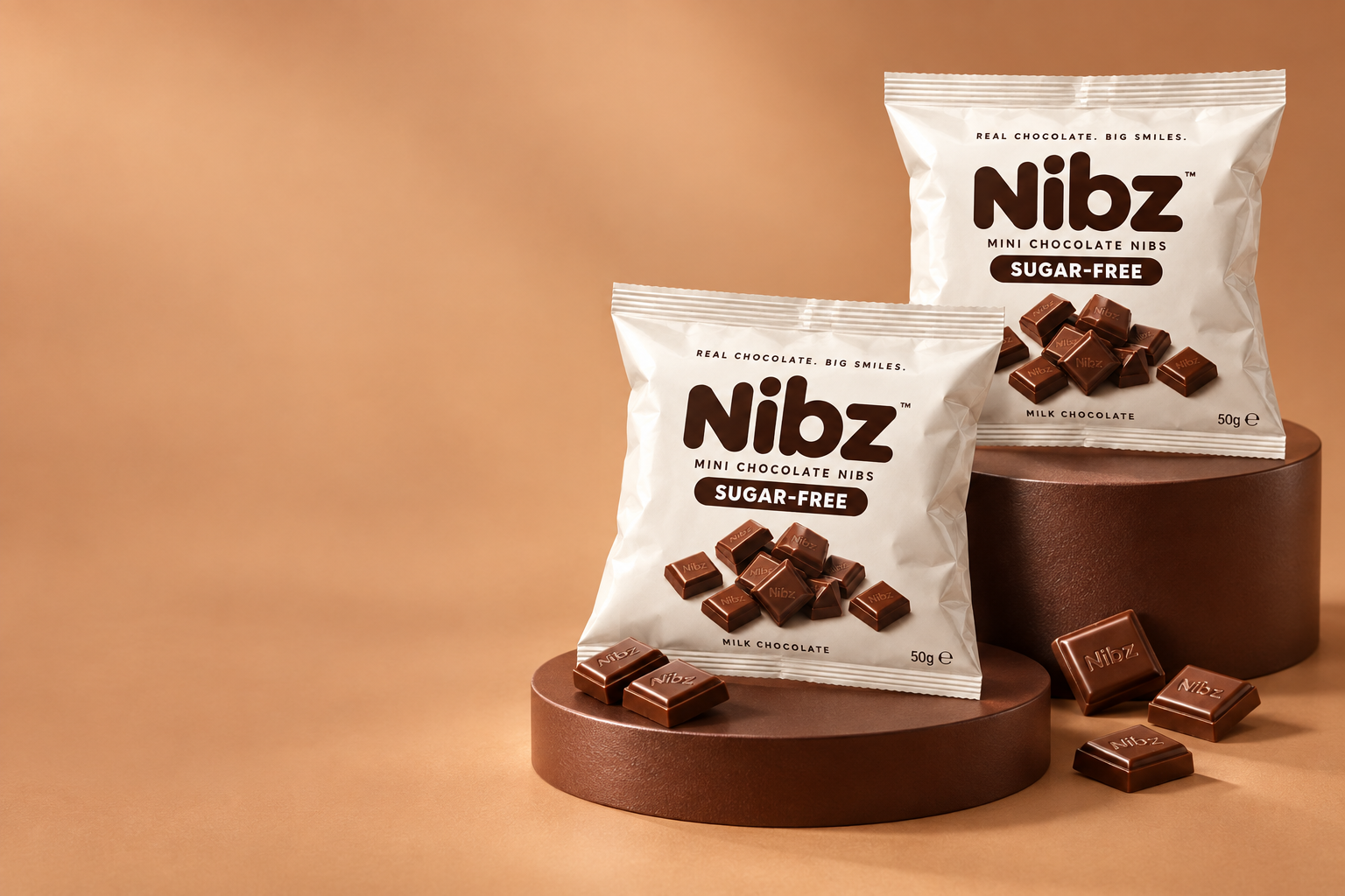 Nibz white chocolate snack pouches on cocoa-brown display stands, with little chocolate squares